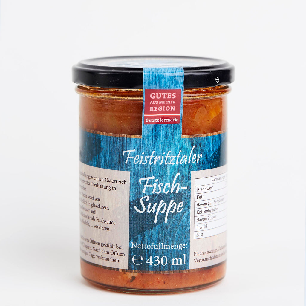 Glass jar of Feistritztaler fish soup with blue label and black lid, 430 ml volume visible.